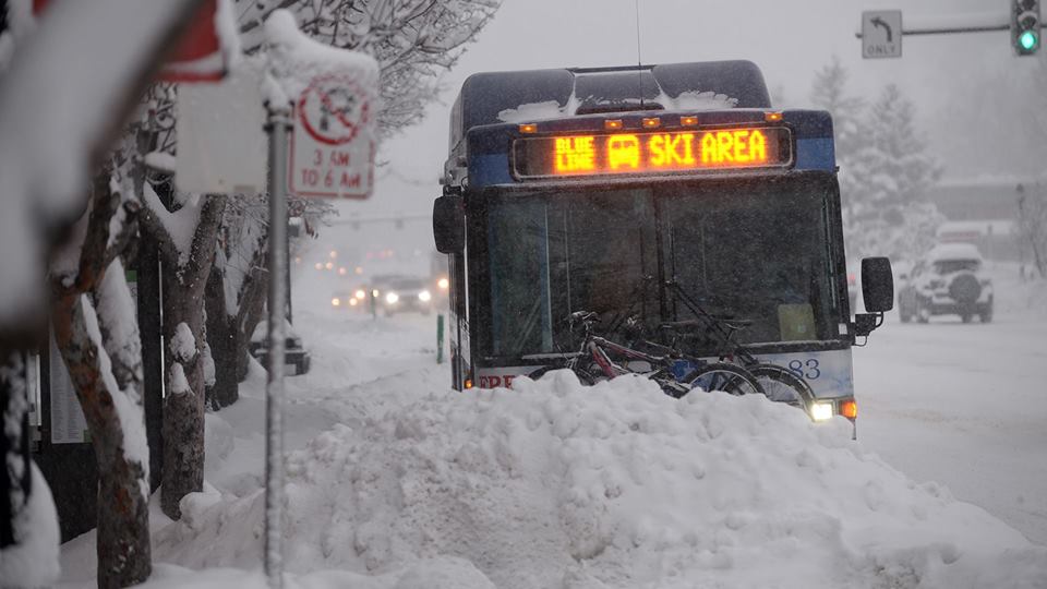 Photo of free City bus carrying snow bikes in winter