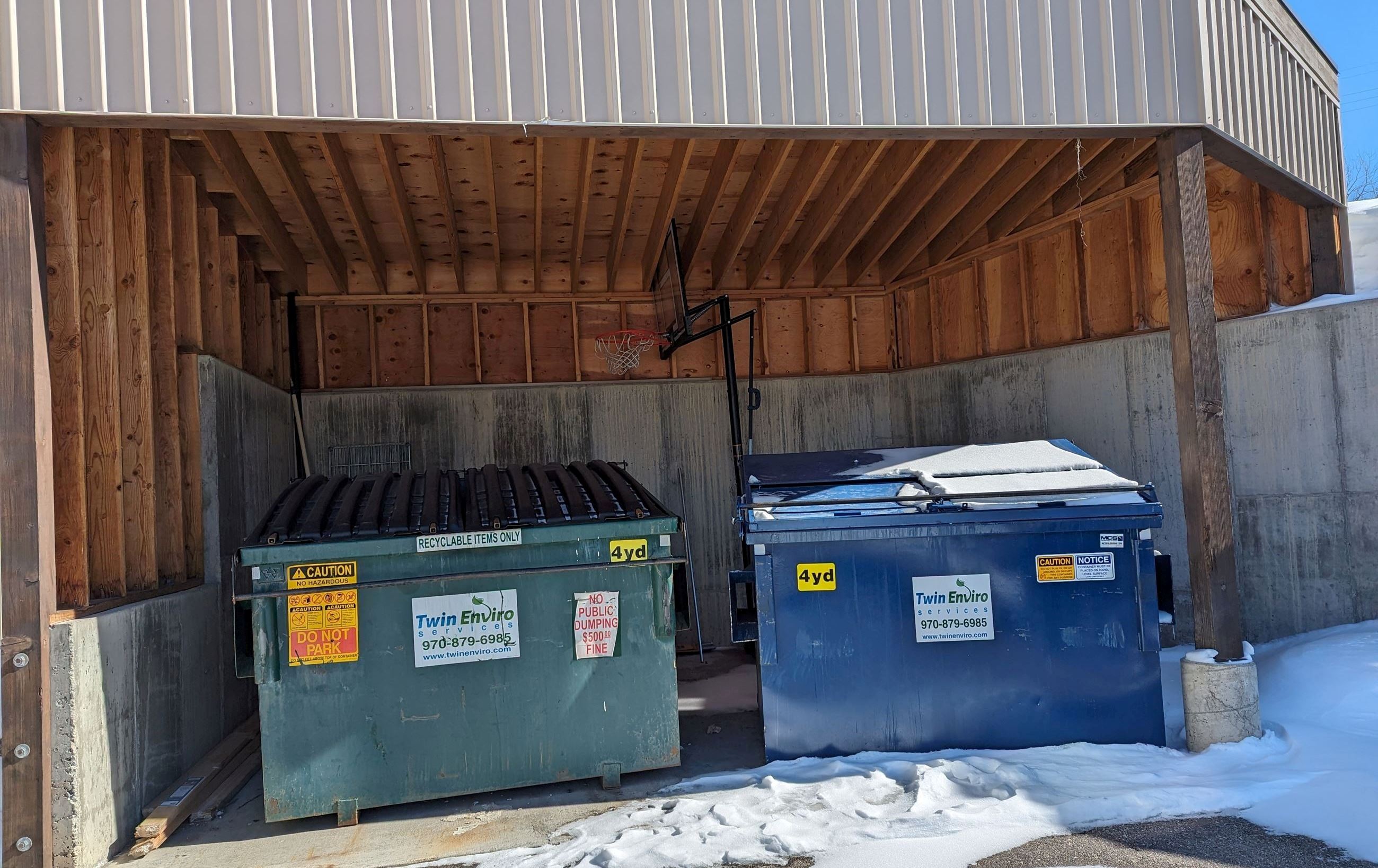 Trash and recycle dumpsters